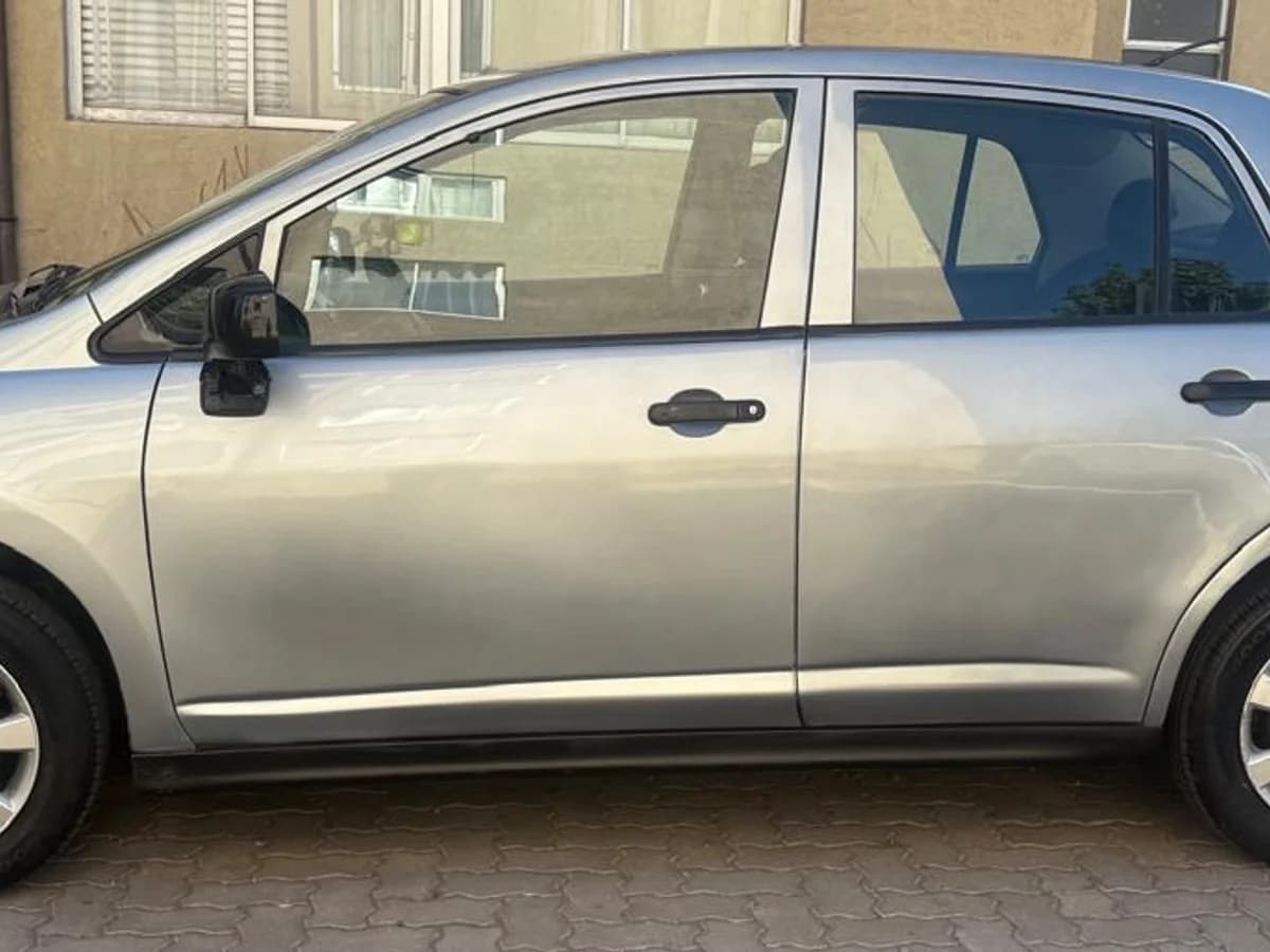 NISSAN Tiida 1.6 S 4X2 LL MT 4P 2012 - Imagen 8